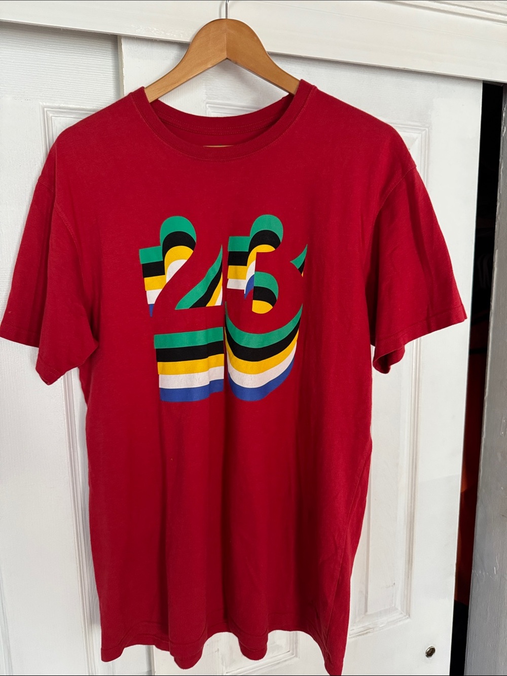 Red Graphic Tee with Colorful Striped '26' Design